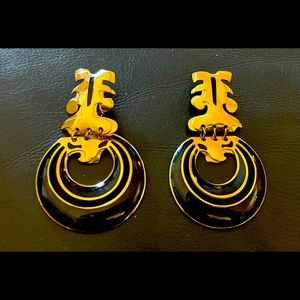Vintage nautical navy blue and gold-tone clip-on Berebi earrings.